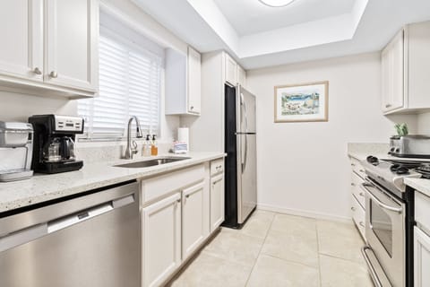 Kitchen has Mr. Coffee machine and single cup Keurig  coffee maker