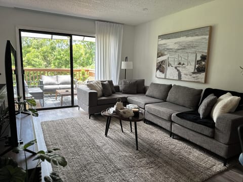 Sink into the cozy sofa, enjoy the glow of the sunset & relax with soft lighting