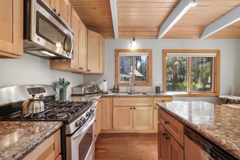 Well stocked kitchen with stainless steel appliances