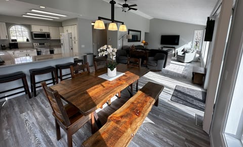 Open floor plan with lots of light. Picture windows face east.