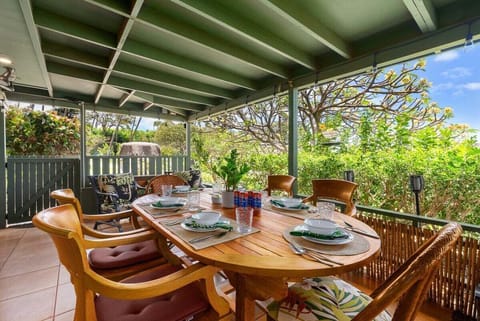 Enjoy your meals on this shaded patio, listening to the sounds of tropical greenery all around