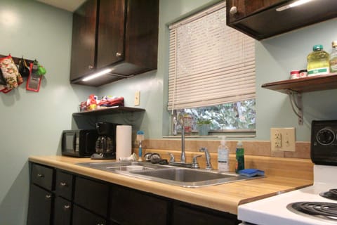 Full kitchen with stove and full size refrigerator coffee and tea. 