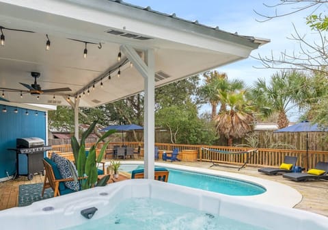 The brand-new hot tub makes this back deck the ultimate relaxation spot!  With room to relax, grill, eat, catch some rays and swim, it's got everything you need!