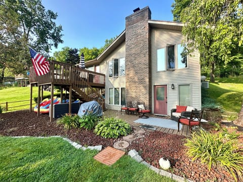 Lakeside rear view of house - before