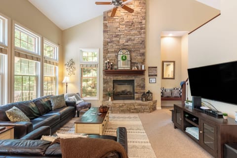 Spacious living room featuring a fireplace perfect for relaxation.