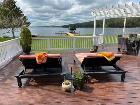 View of Lake and relaxing lounger deck.