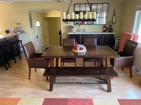 Dinning room table and wet bar.