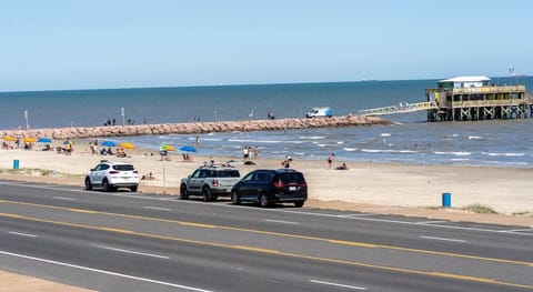 From the balcony you see beach and fishing pier