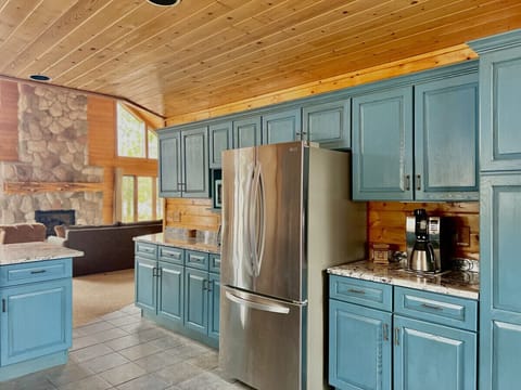Kitchen leads into the living room