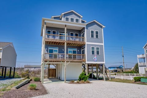 A spacious, elevated coastal home with multiple balconies and scenic ocean views