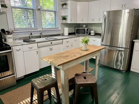 Well-appointed kitchen with island for prep, meals, or morning coffee