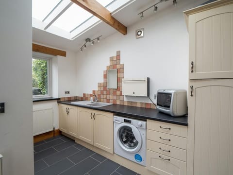 Washing machine, sink, and draws and cupboards