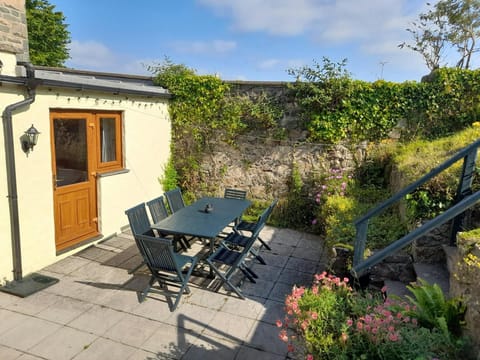 Patio area with table and eight chairs