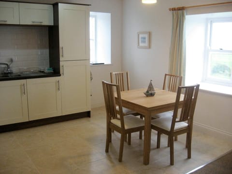 Kitchen diner with dining table and four chairs