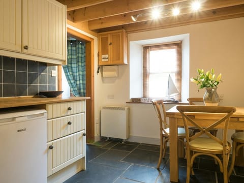 Kitchen table and chairs and kitchen cabinets