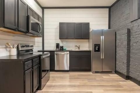 Our full kitchen features stainless steel appliances and all the cookware you need