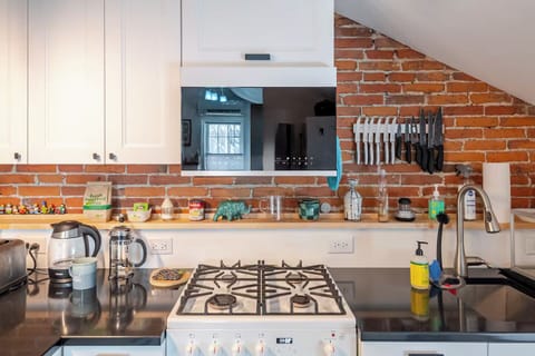 Full kitchen has everything you need from pots and pans to spices and oil.