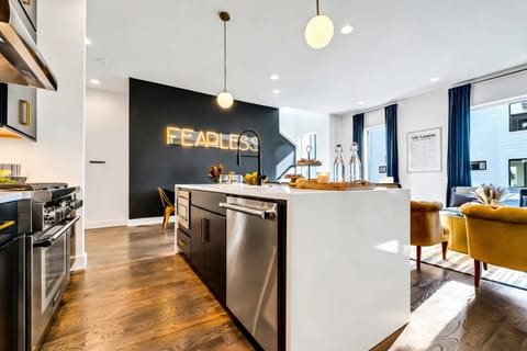 Step into style and comfort in this chic Nashville vacation home! With a modern kitchen perfect for group gatherings and the bold statement FEARLESS, your getaway starts here. Experience the best of Music City with Misfit Homes. Book now!