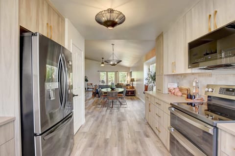 With its well-organized layout and essential appliances, the kitchen facilitates efficiency and convenience in meal preparation.