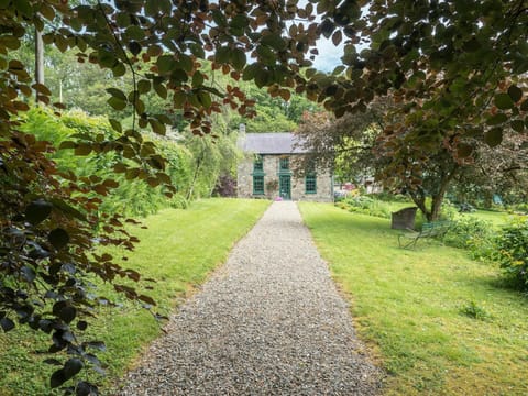 Gravel path and lawns leading to front of house