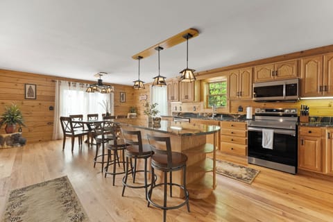 Spacious kitchen fully updated and equipped- cook with a vista!