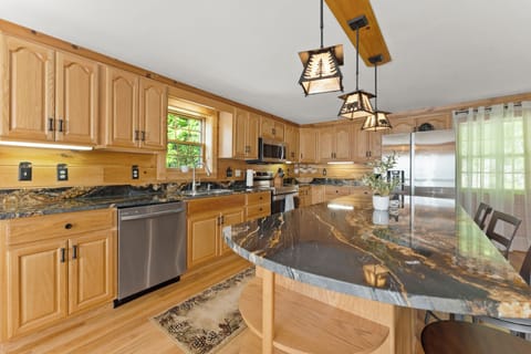 Spacious kitchen fully updated and equipped- cook with a vista!
