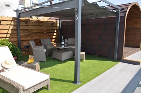 The Glamping Pod and garden seating area