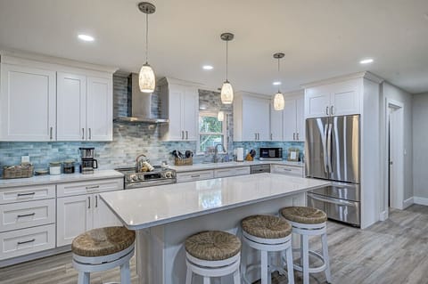 Fully equipped kitchen with large island.