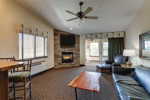 Kick back by the glowing fireplace for cozy movie nights.