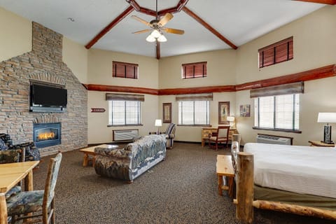 Gather around the stone fireplace for warm, relaxing evenings.