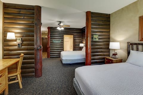 Stretch out comfortably in this spacious, lodge-style bedroom.