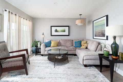 This adorable cottage exudes charm and grace throughout, starting in the living area.  We'll take a quick tour of the home, then do a second pass to show more pictures.  Here we go!