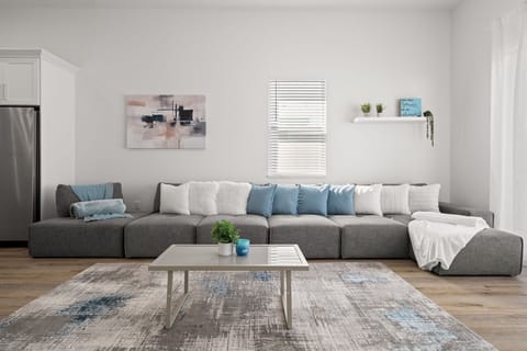 Large sectional sofa and plenty of seating for everyone.