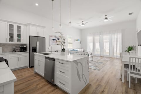 Fully equipped kitchen with a large island- perfect for cooking together