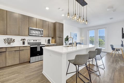 Cook, dine, and enjoy in this welcoming kitchen space, perfect for your short-term rental stay.