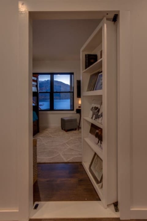 Bookshelf or secret entrance to bunk room?