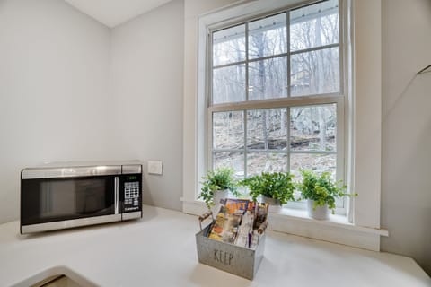 Enjoy the view of the back yard while cooking