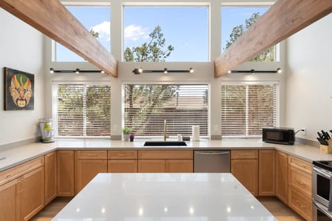 Newly Renovated, Fully Stocked Kitchen with Plenty of Natural Light.