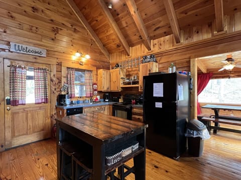 Island with stools for eating at or extra prep space