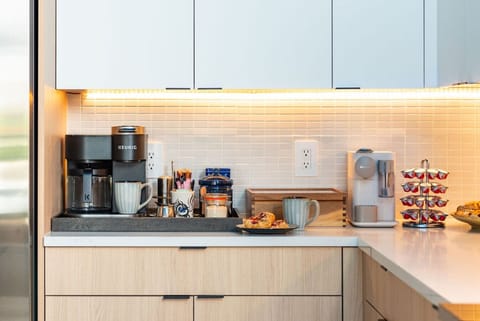 Double coffee station so you can choose between espresso, single cup, or brewed coffee