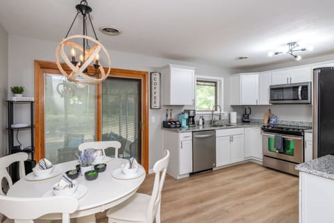 Located next to the living room, the dining space encourages easy conversation and togetherness.