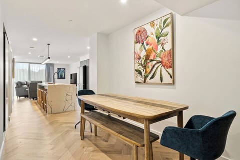 Meals at home are a breeze with a spacious dining table seating all four guests.