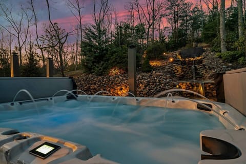 Mega Hot Tub with Views of Water Fall.