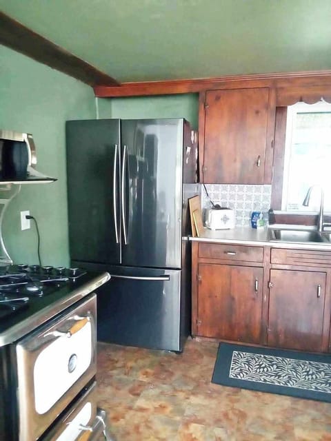 full kitchen - large fridge, chef's choice reproduction gas stove, dishwasher...