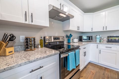 The charm of our Open Kitchen, a beautifully designed space that combines functionality with style.