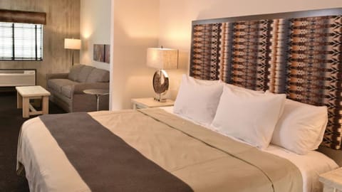 Sink into crisp pillows, then lounge on the sofa nearby.