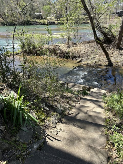Steps down to the private river runoff area
