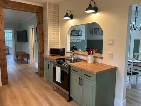 We have a state of the art induction stove and all the proper pots and pans for enjoying meals together.