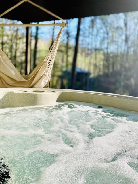 Brand new hot tub; under the treehouse chalet