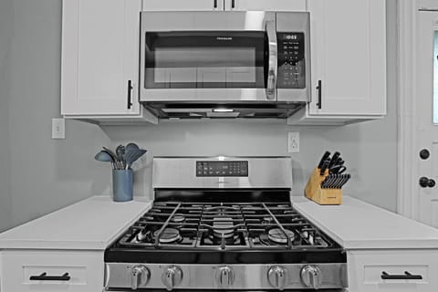 Sleek stainless steel appliances and ample prep space for culinary adventures.